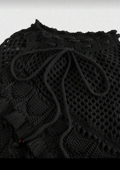 Falda corta tejida de dama.