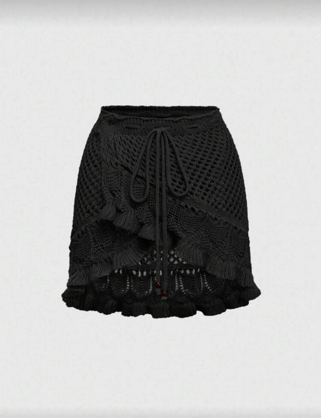 Falda corta tejida de dama.