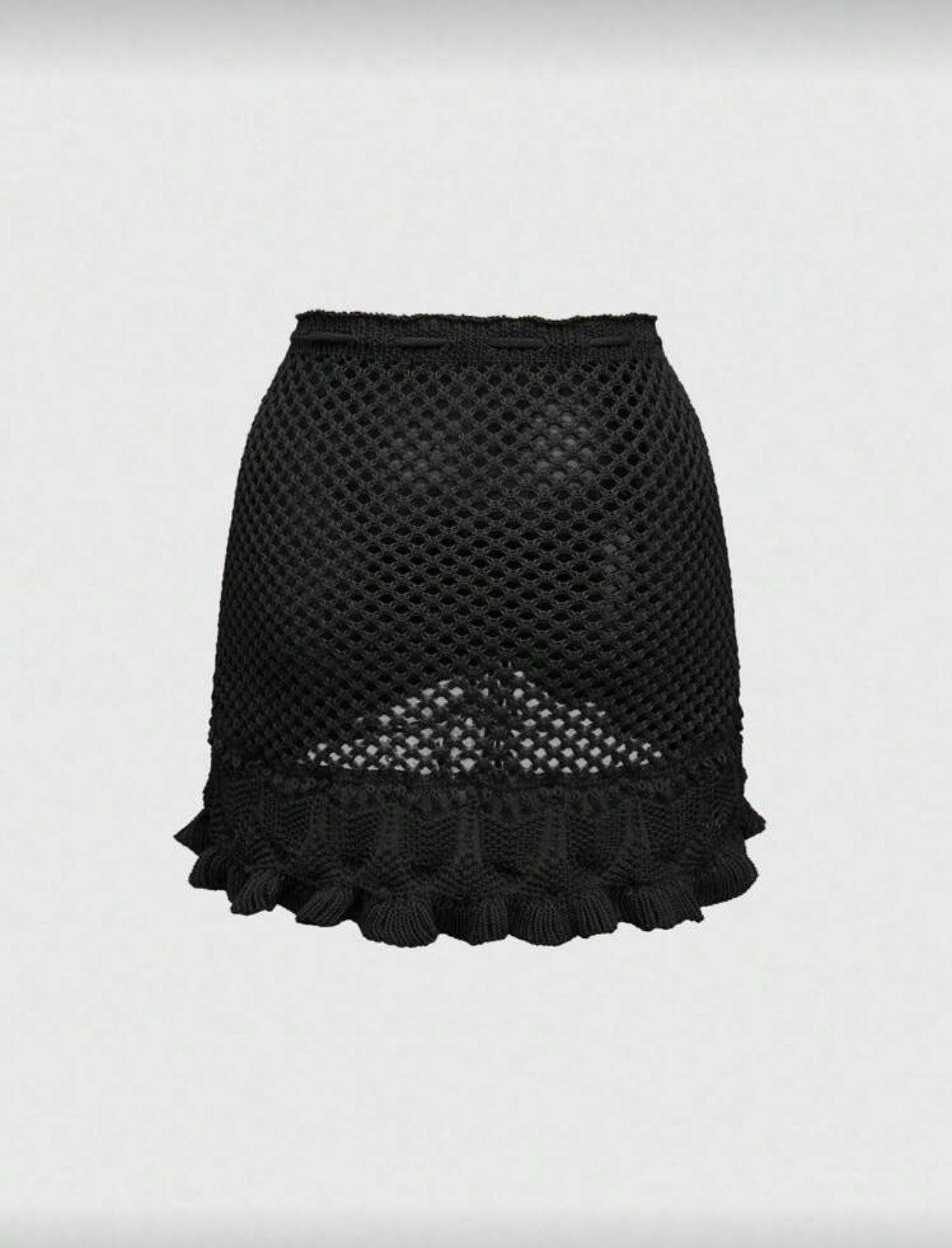 Falda corta tejida de dama.