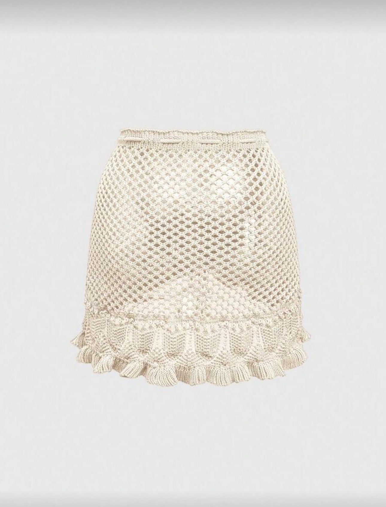 Falda corta tejida de dama.